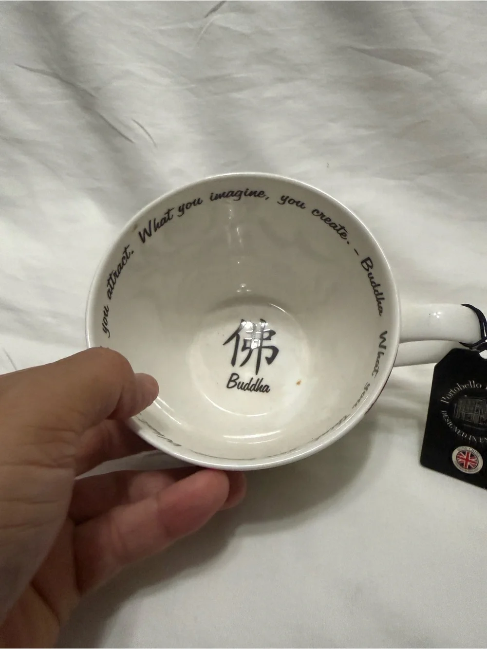 Buddha Stoneware Tea Cup - White and Black with Floral Accents